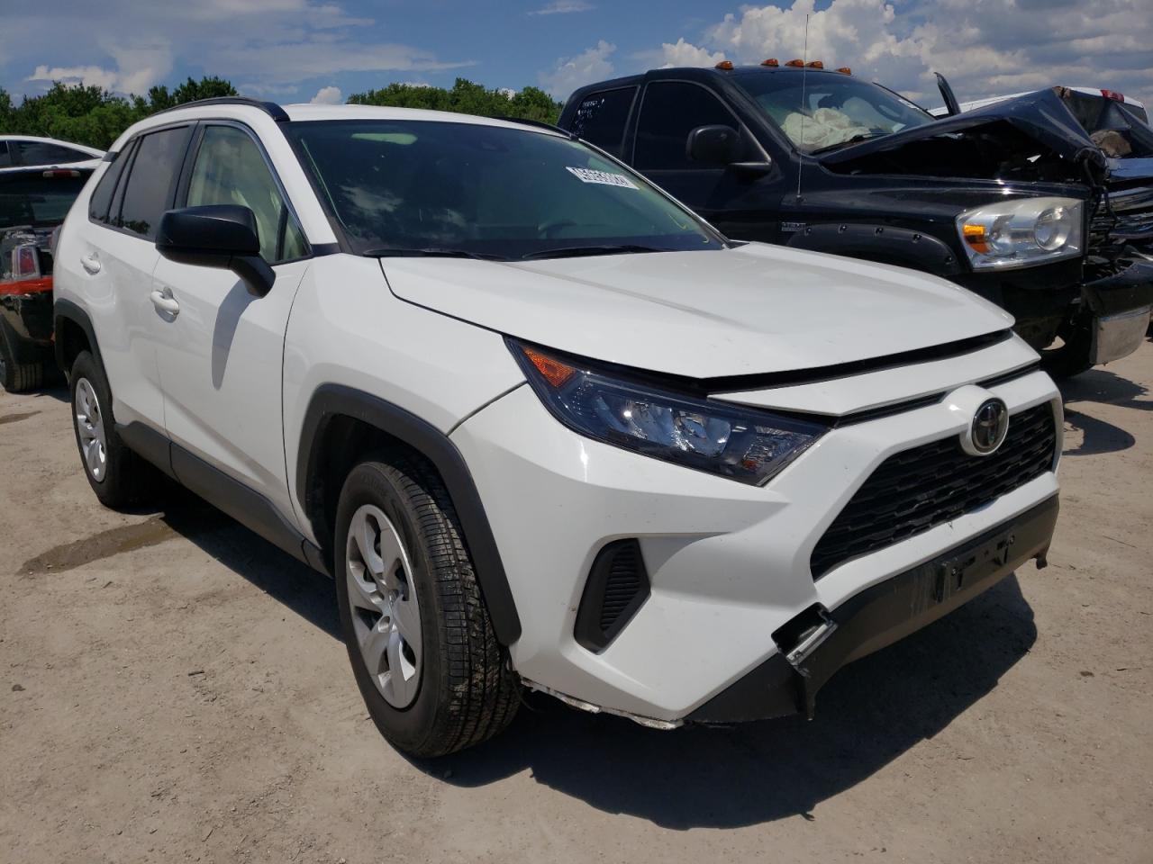 TOYOTA RAV4 LE 2019 with VIN JTMF1RFV7KJ011086 - Photo from auction