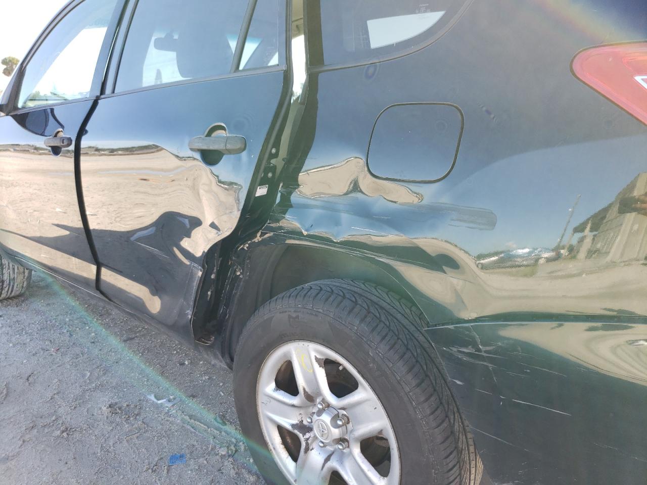 Photo 9 from auction – 2009 TOYOTA RAV4 with VIN JTMZF33V39D009621
