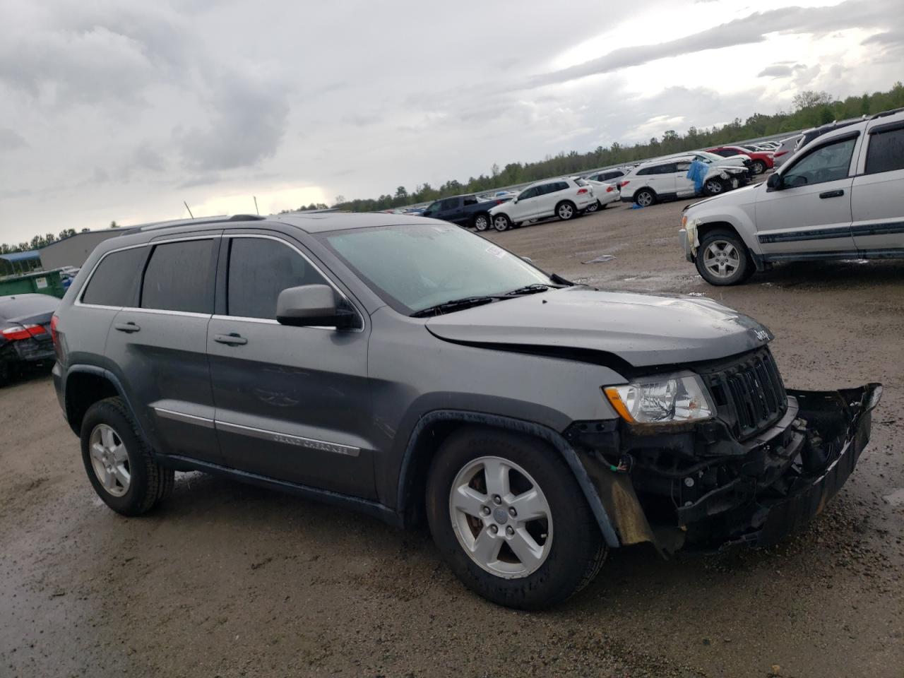 JEEP GRAND CHER 2011 with VIN 1J4RS4GG1BC659602 - Photo from auction