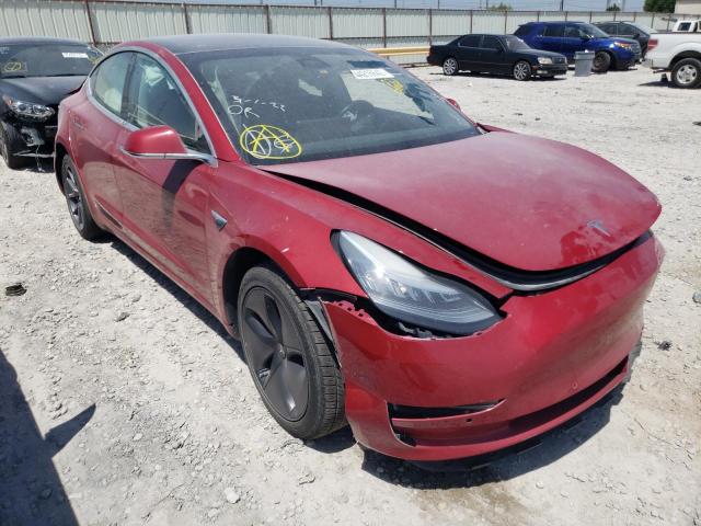 TESLA MODEL 3 2018 with VIN 5YJ3E1EB1JF129964 - Photo from auction