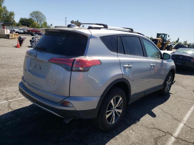 Photo 4 from auction – 2017 TOYOTA RAV4 XLE with VIN 2T3RFREV6HW633558