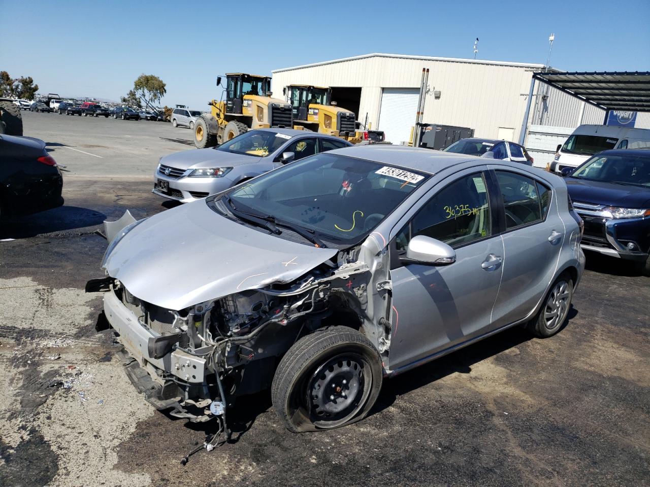 Photo 2 from auction – 2015 TOYOTA PRIUS C with VIN JTDKDTB39F1585685