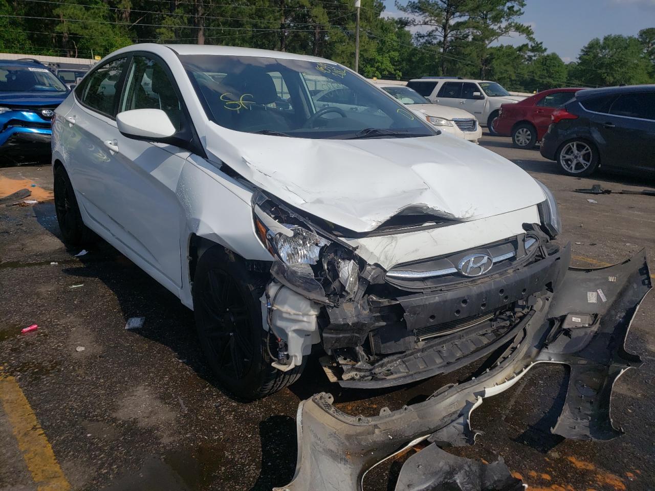 HYUNDAI ACCENT GLS 2015 with VIN KMHCT4AE6FU907256 - Photo from auction