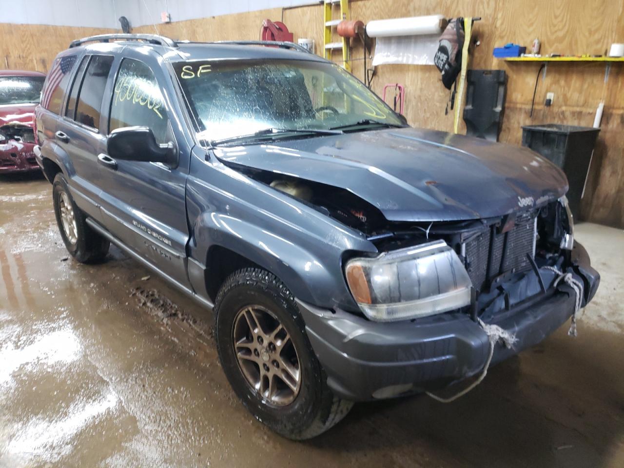 JEEP GRAND CHER 2002 with VIN 1J4GW48S42C129008 - Photo from auction