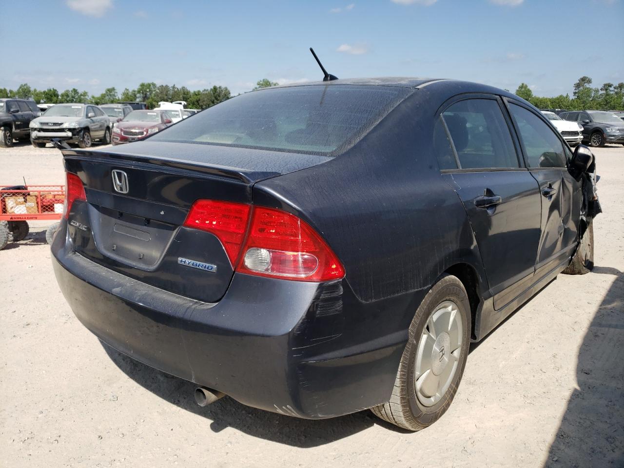 Photo 4 from auction – 2006 HONDA CIVIC HYBR with VIN JHMFA36206S027888