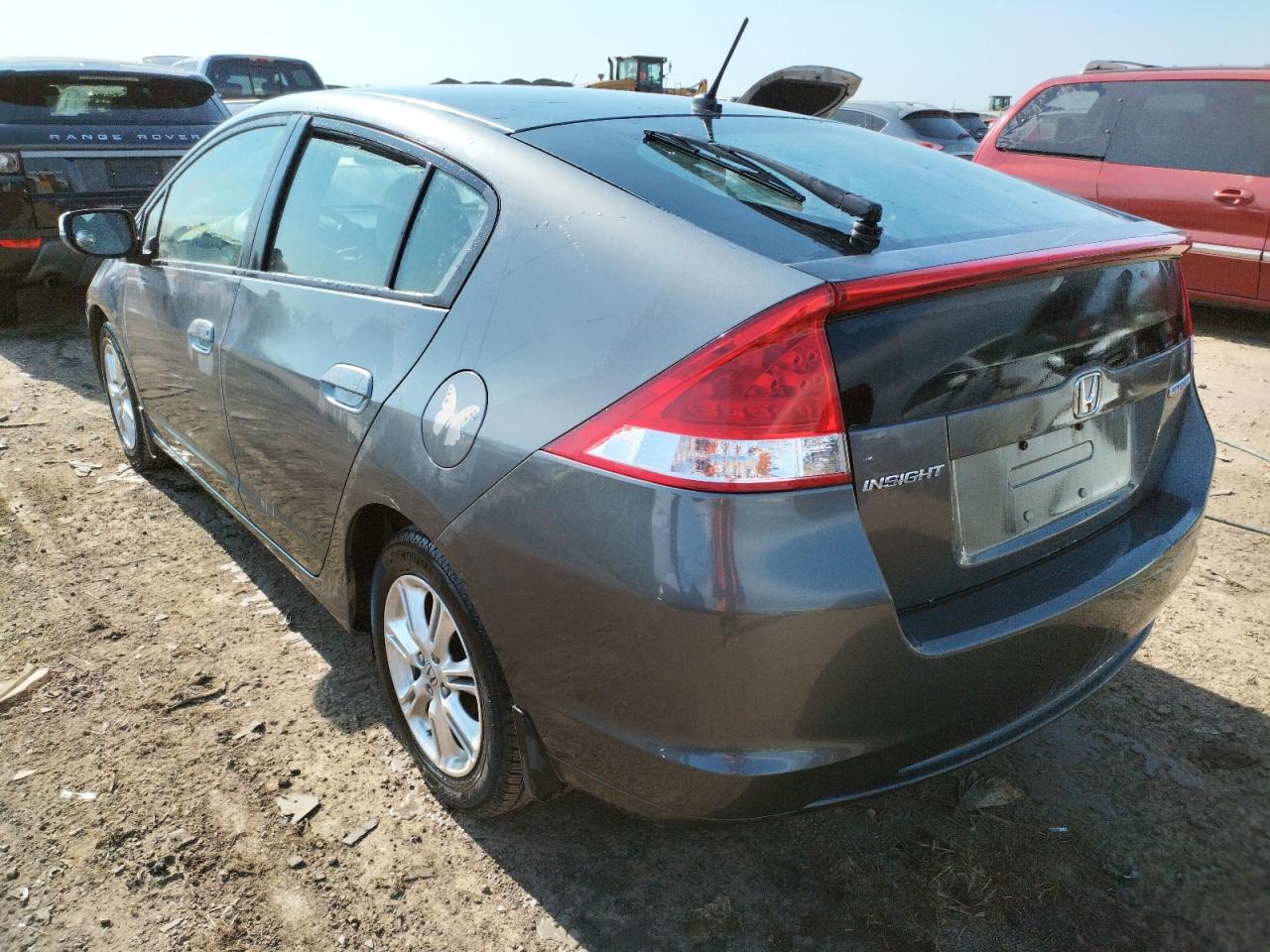 Photo 3 from auction – 2010 HONDA INSIGHT EX with VIN JHMZE2H72AS027601
