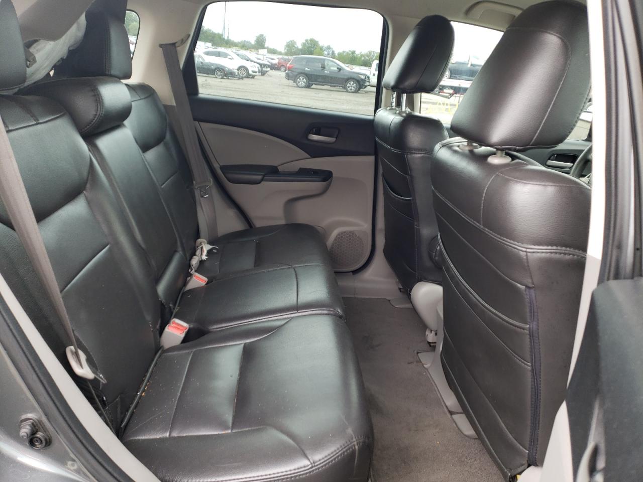 Photo 17 from auction – 2014 HONDA CRV with VIN 2HKRM3H31EH509729