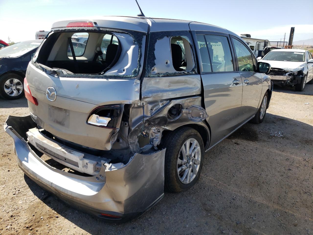 Photo 4 from auction – 2013 MAZDA 5 with VIN JM1CW2BL0D0154549