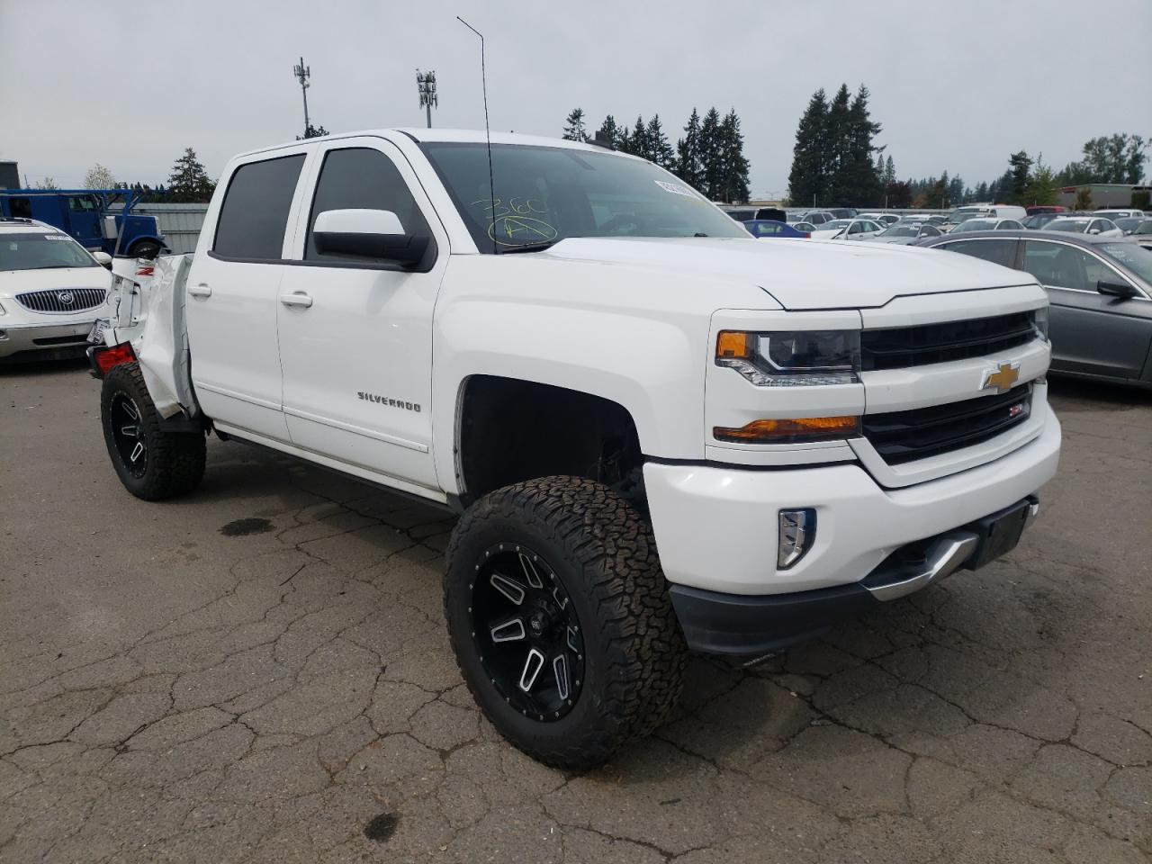 CHEVROLET SILVERADO 2018 with VIN 3GCUKREC2JG414106 - Photo from auction