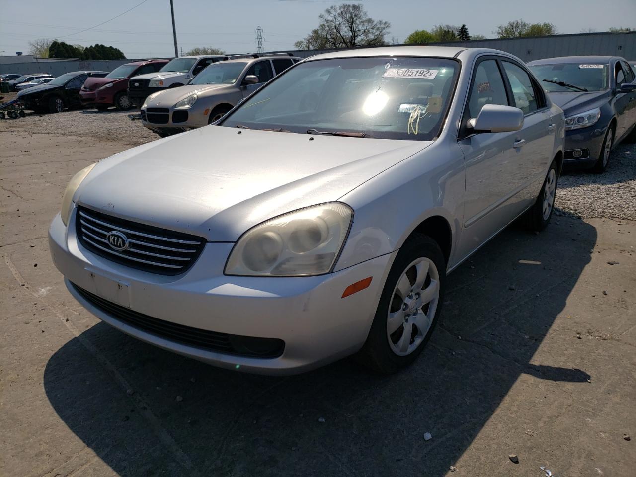Photo 2 from auction – 2006 KIA OPTIMA LX with VIN KNAGE123565058059