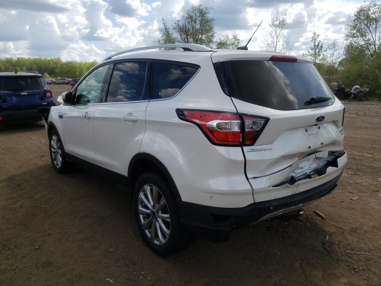 Photo 3 from auction – 2017 FORD ESCAPE TIT with VIN 1FMCU0JD5HUD82545