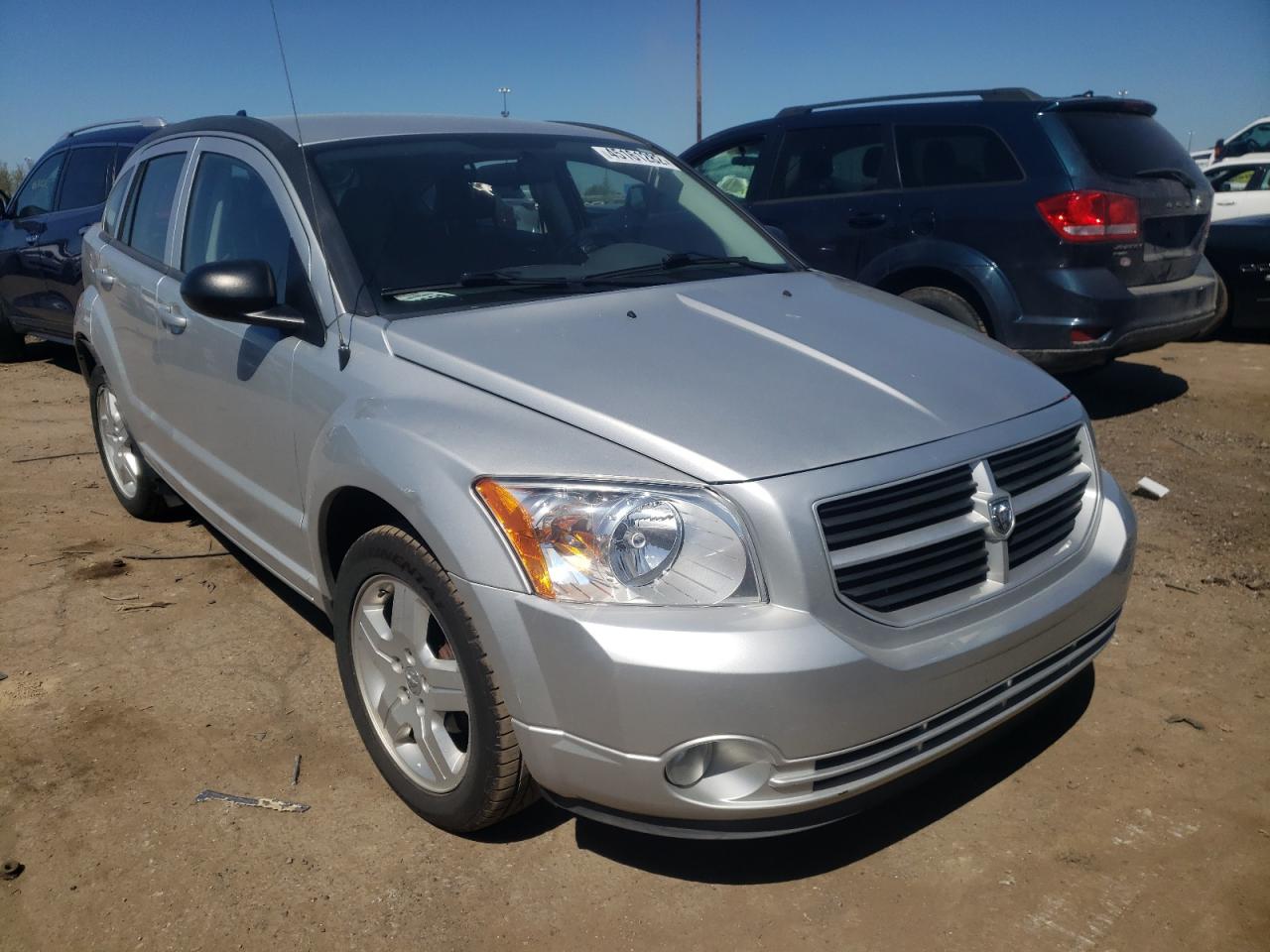 DODGE CALIBER SX 2009 with VIN 1B3HB48A29D233497 - Photo from auction