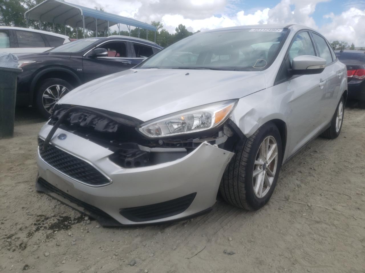 Photo 2 from auction – 2016 FORD FOCUS SE with VIN 1FADP3F28GL401995