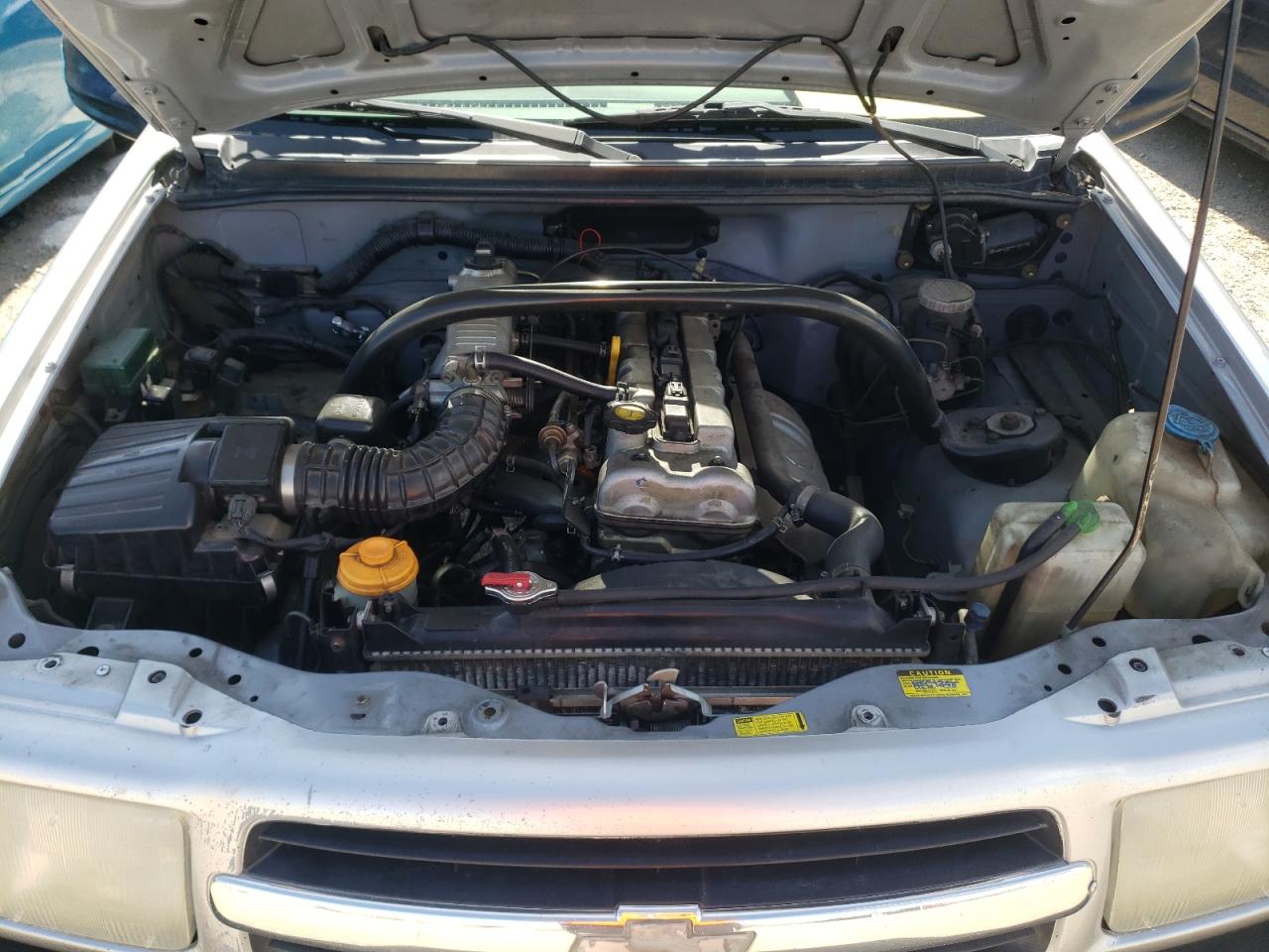 Photo 7 from auction – 2001 CHEVROLET TRACKER with VIN 2CNBJ13C116936828