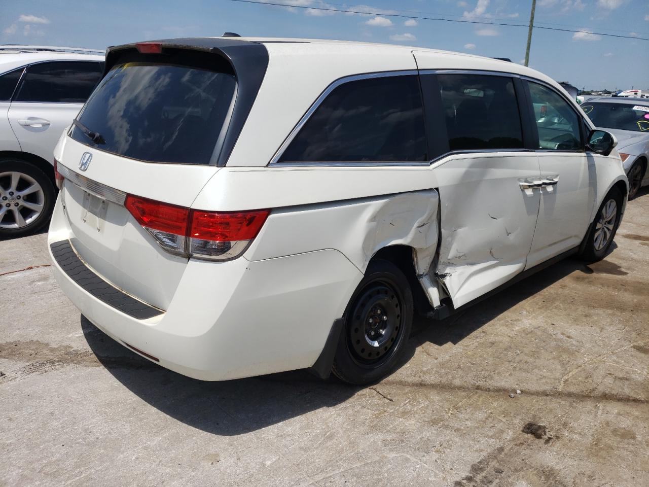 Photo 4 from auction – 2014 HONDA ODYSSEY EX with VIN 5FNRL5H60EB101200