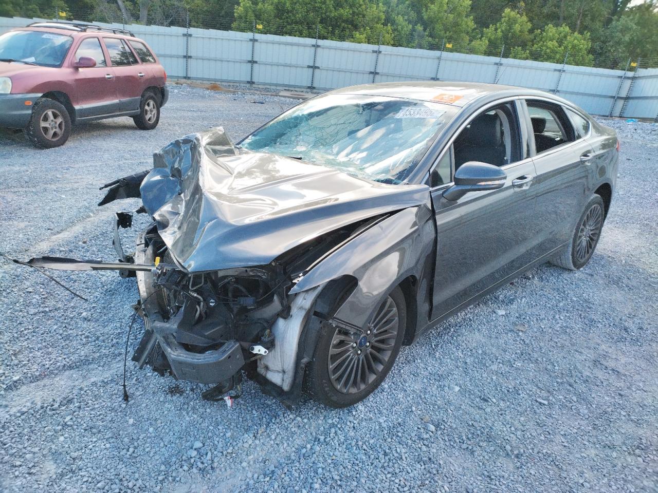Photo 2 from auction – 2018 FORD FUSION TIT with VIN 3FA6P0D95JR137764