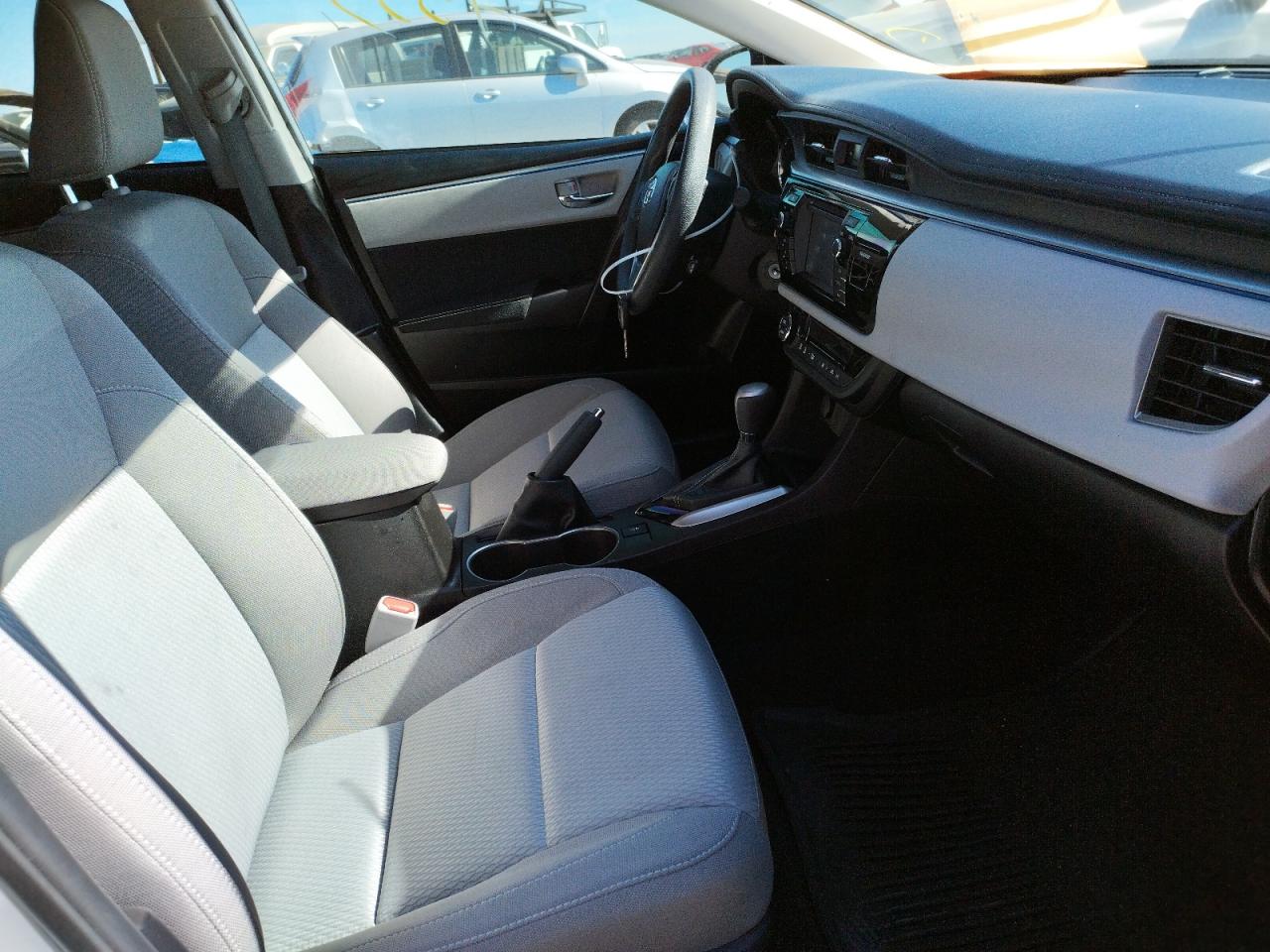 Photo 19 from auction – 2016 TOYOTA COROLLA L with VIN 5YFBURHE0GP546864