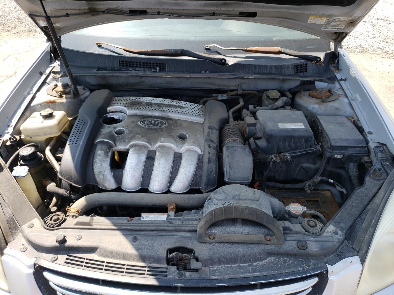Photo 7 from auction – 2006 KIA OPTIMA LX with VIN KNAGE123565058059