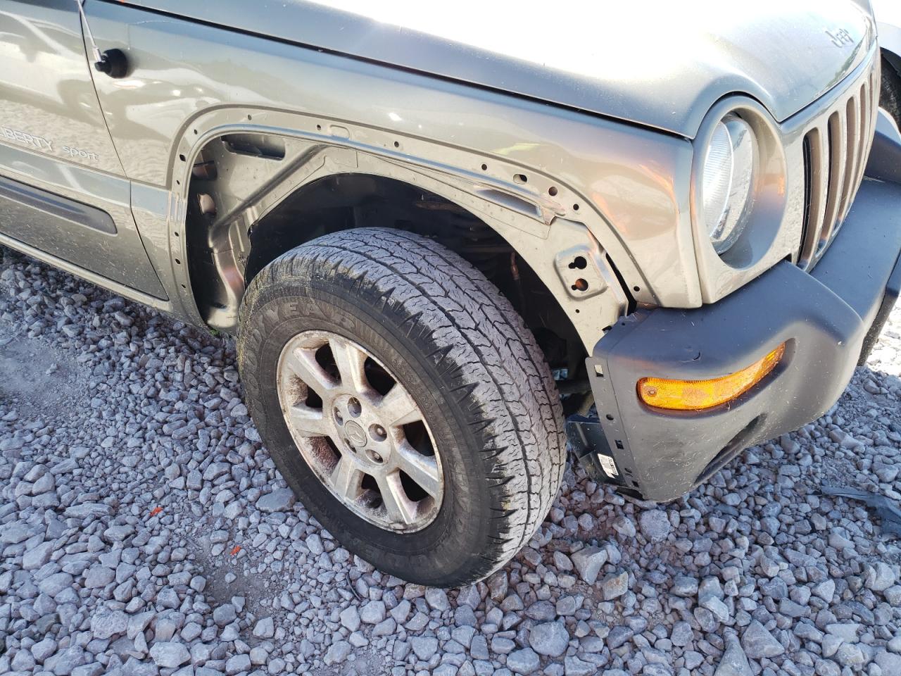 Photo 9 from auction – 2003 JEEP LIBERTY SP with VIN 1J4GL48K83W718426