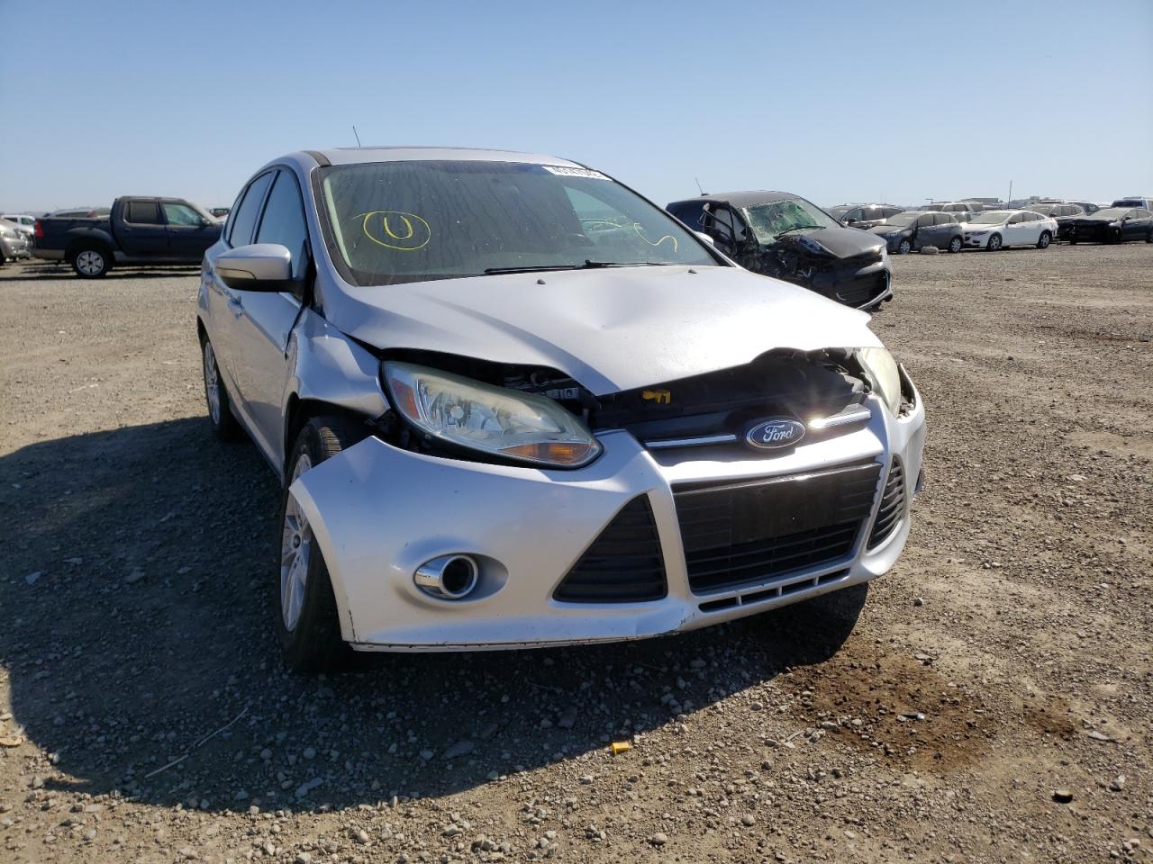FORD FOCUS SEL 2012 with VIN 1FAHP3M23CL338643 - Photo from auction