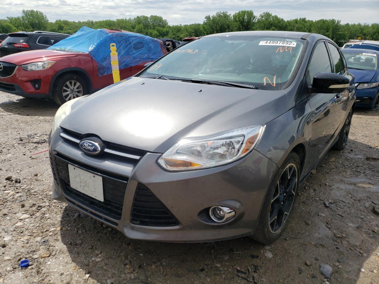 Photo 2 from auction – 2013 FORD FOCUS SE with VIN 1FADP3K23DL280763