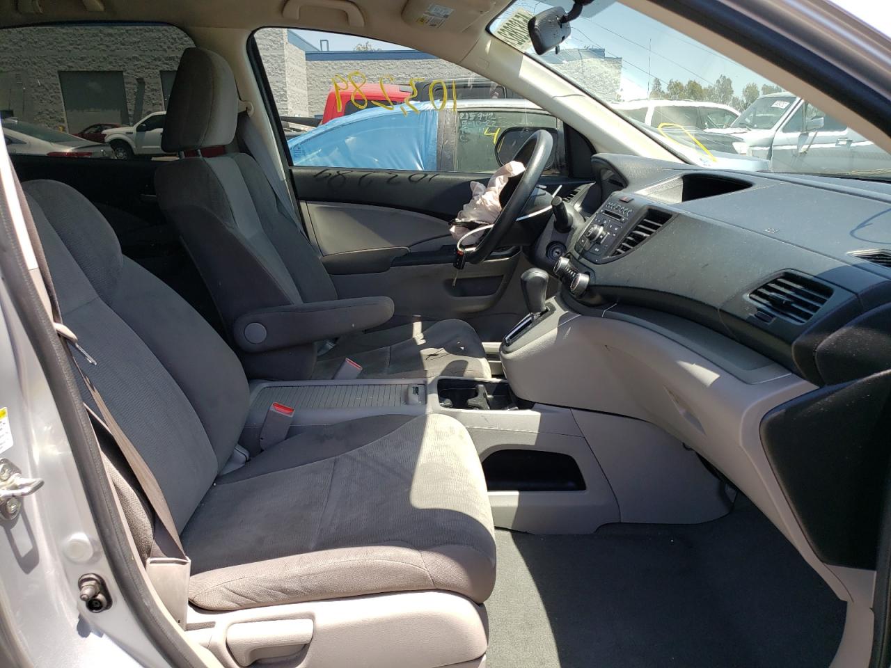 Photo 5 from auction – 2014 HONDA CR-V LX with VIN 2HKRM3H39EH515407
