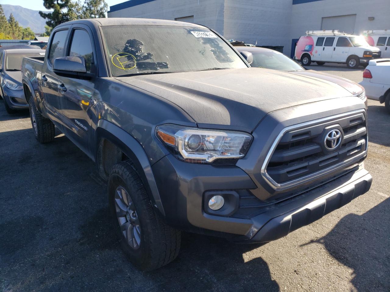 TOYOTA TACOMA DOU 2017 with VIN 3TMBZ5DN9HM005806 - Photo from auction
