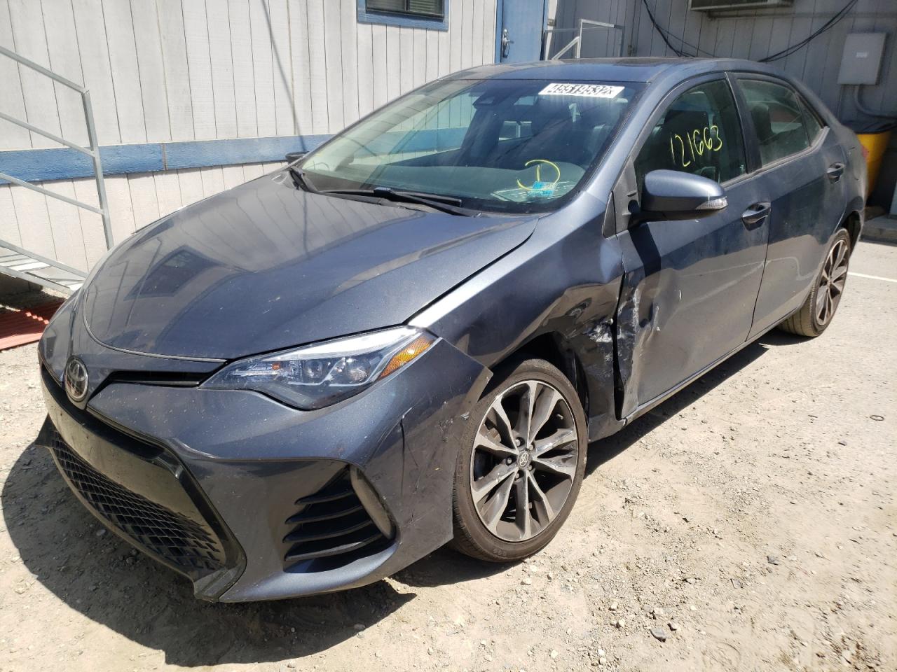Photo 14 from auction – 2017 TOYOTA COROLLA L with VIN 5YFBURHE2HP583237