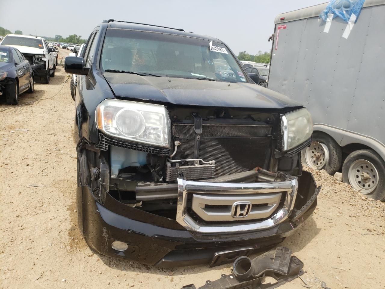 Photo 9 from auction – 2011 HONDA PILOT EX with VIN 5FNYF4H49BB100134