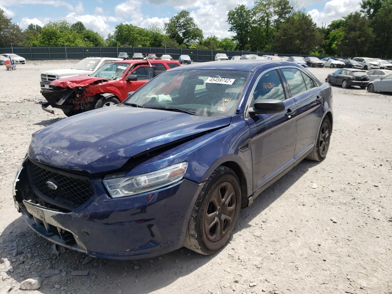 Photo 2 from auction – 2013 FORD TAURUS POL with VIN 1FAHP2M81DG121424