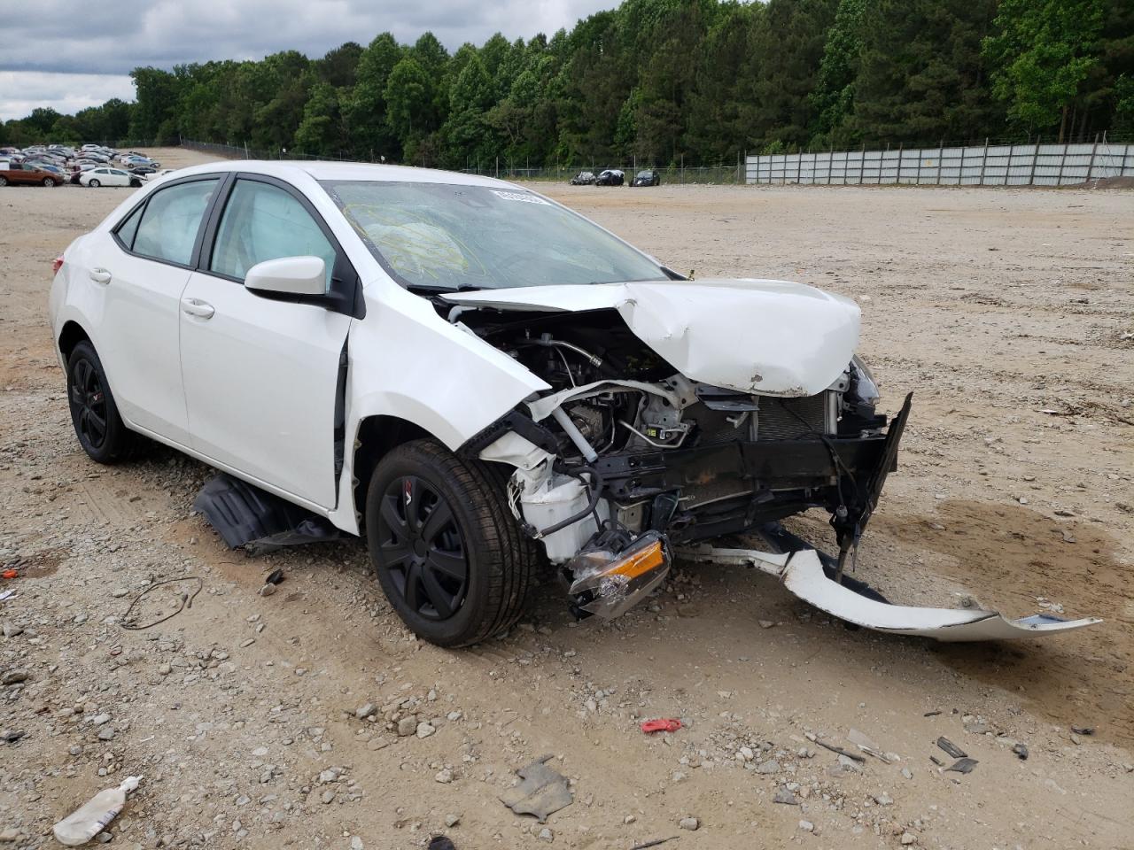 TOYOTA COROLLA L 2017 with VIN 5YFBURHEXHP579873 - Photo from auction