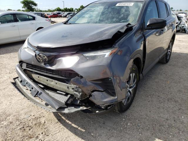 Photo 9 from auction – 2018 TOYOTA RAV4 LE with VIN 2T3ZFREV0JW410048