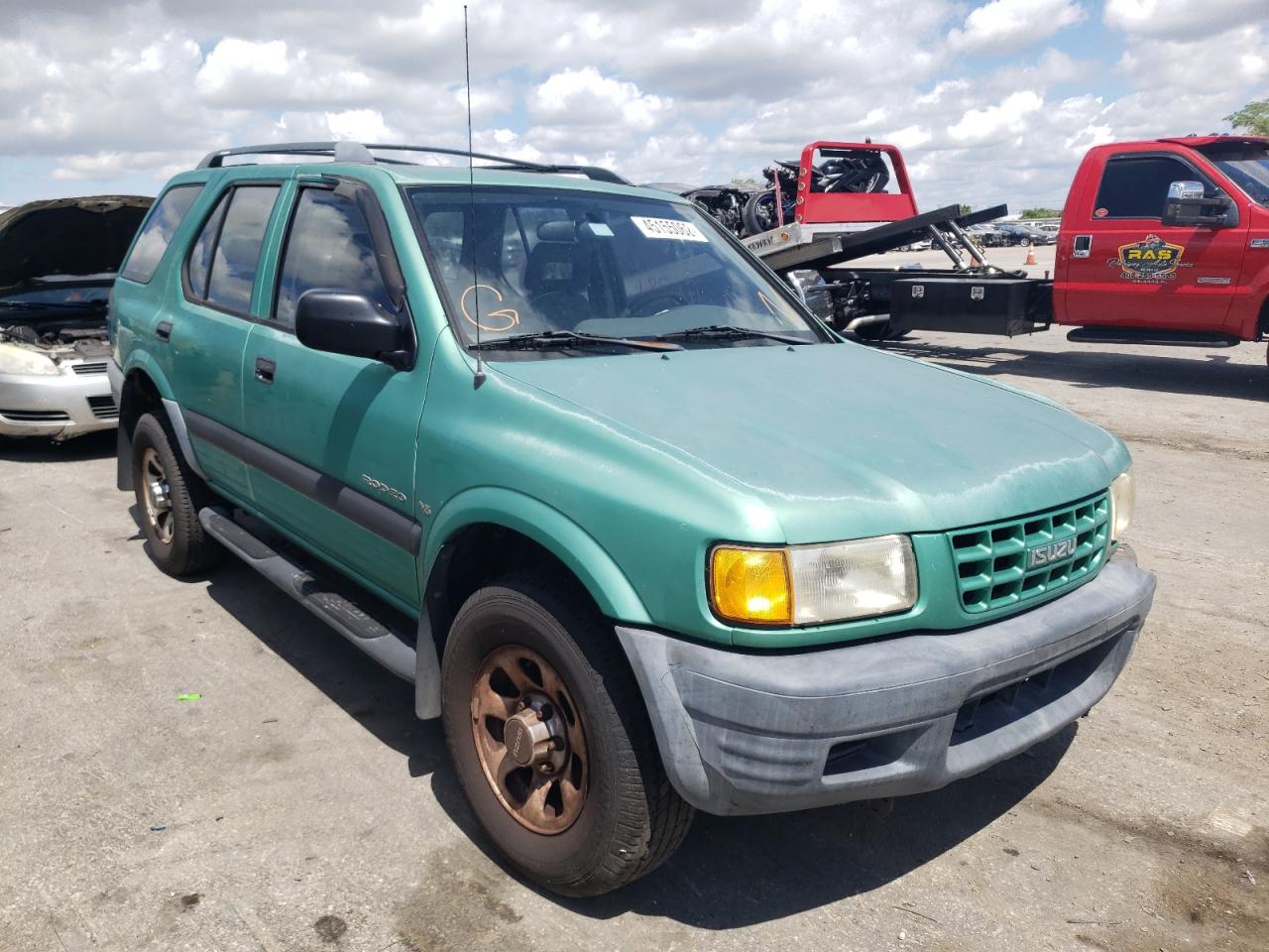 ISUZU RODEO S 1999 with VIN 4S2CK58W4X4314853 - Photo from auction