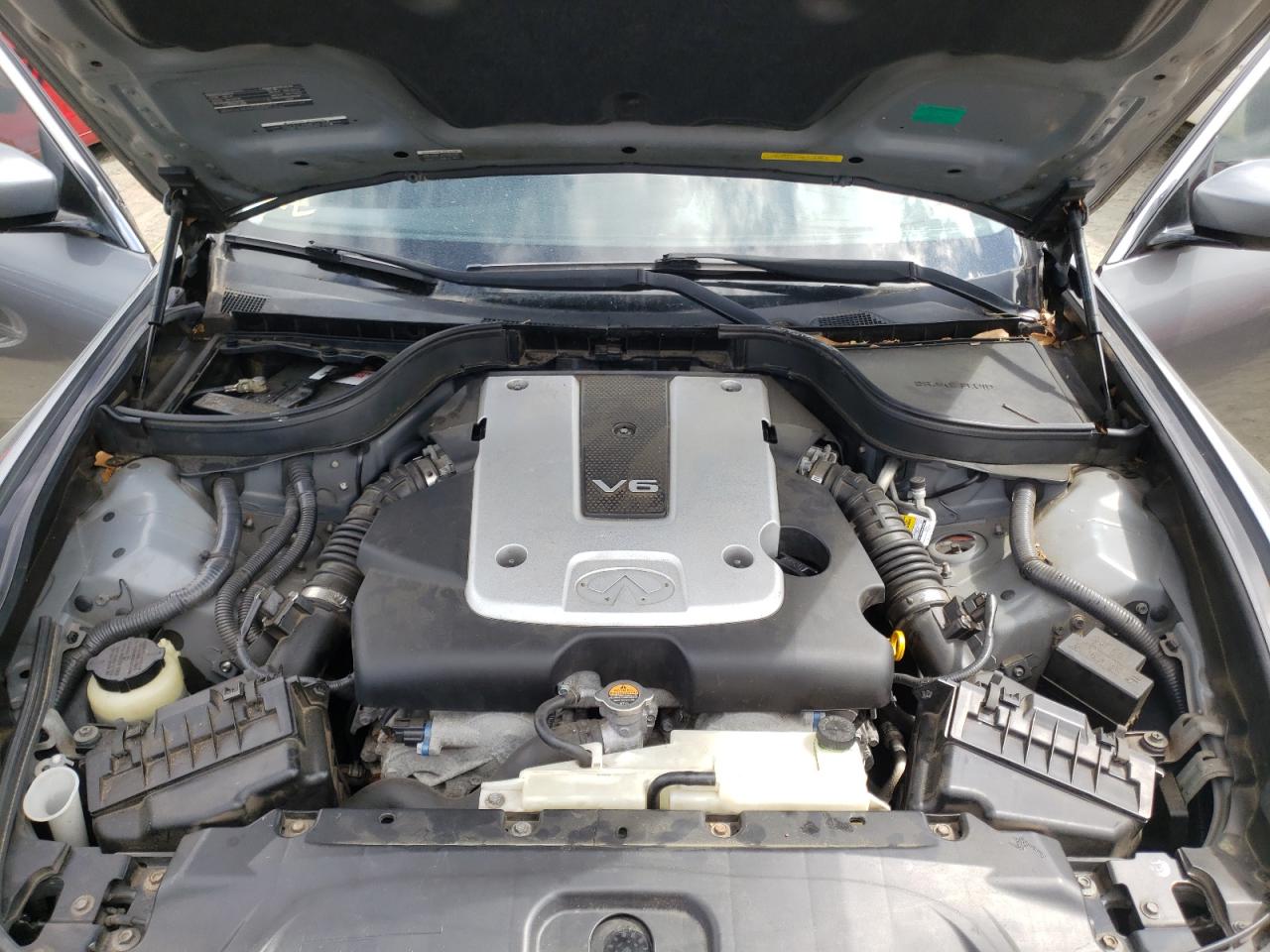 Photo 7 from auction – 2011 INFINITI G25 with VIN JN1DV6AR1BM653177