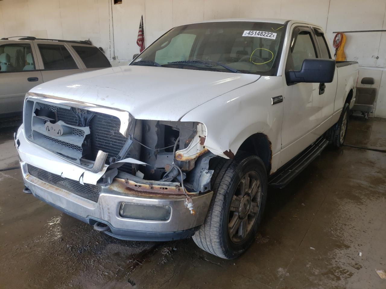 Photo 2 from auction – 2004 FORD F150 with VIN 1FTRX14W64NA93560