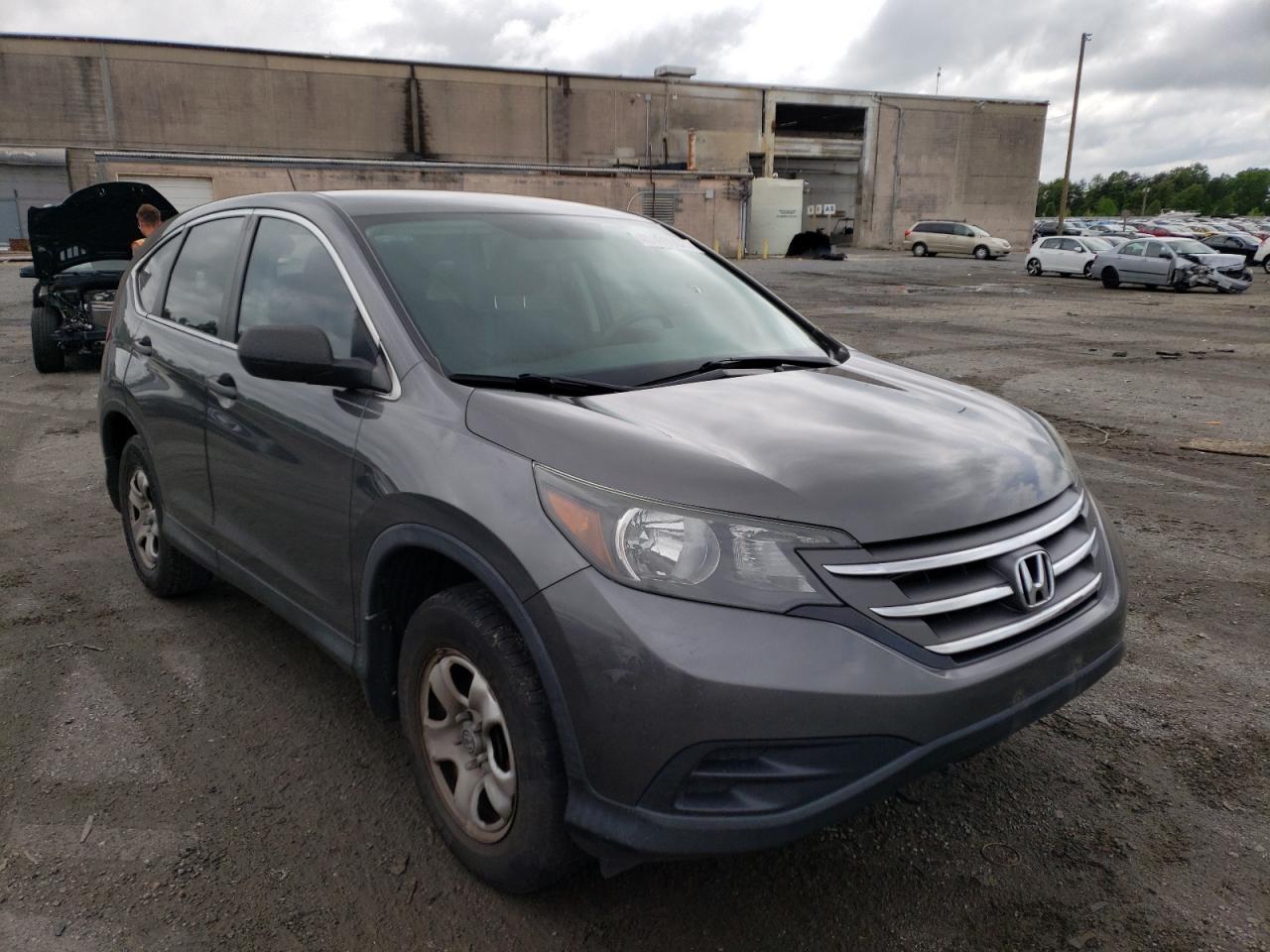 Photo 13 from auction – 2014 HONDA CRV with VIN 2HKRM3H31EH509729