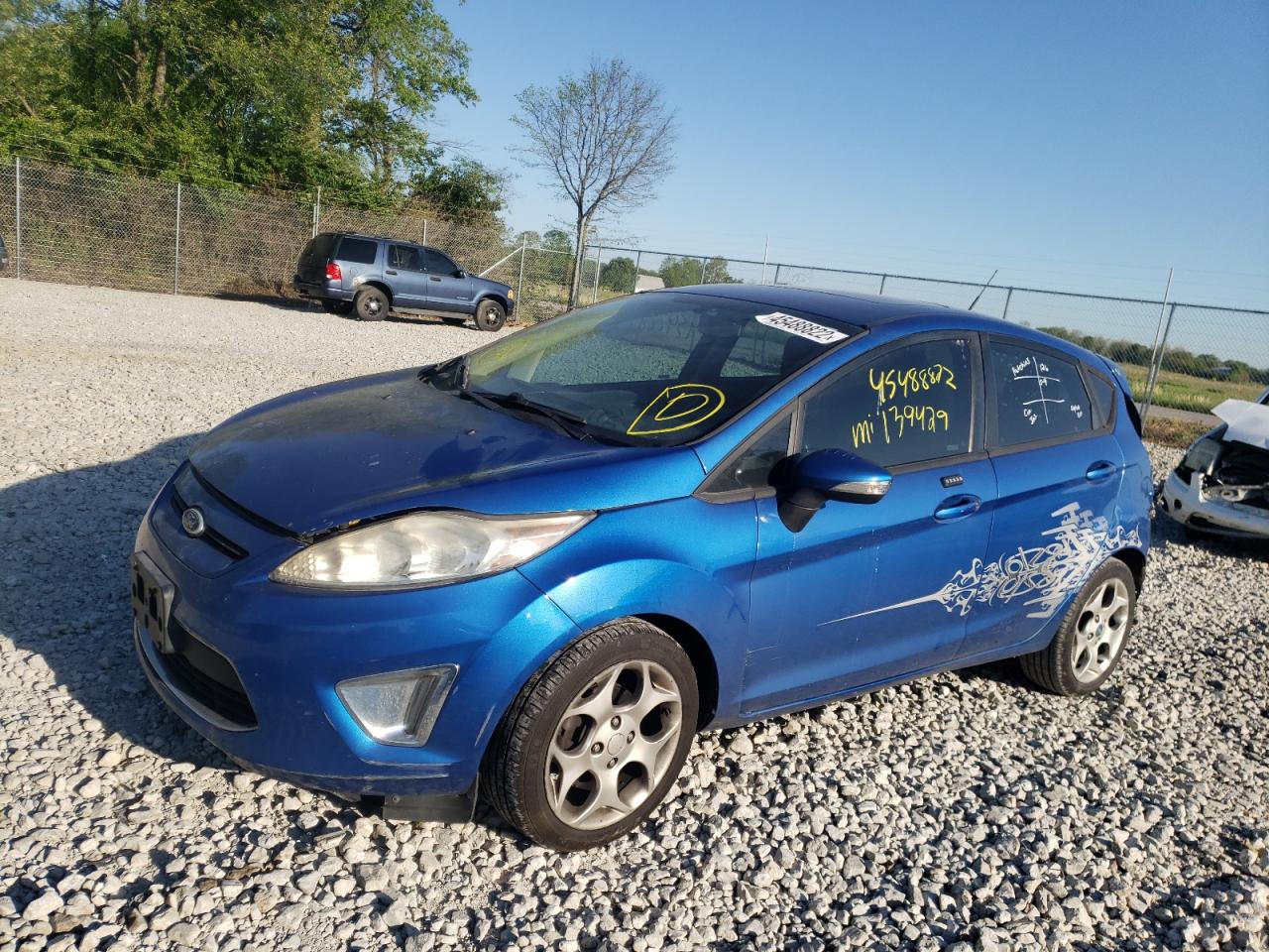 Photo 2 from auction – 2011 FORD FIESTA SES with VIN 3FADP4FJ3BM142434