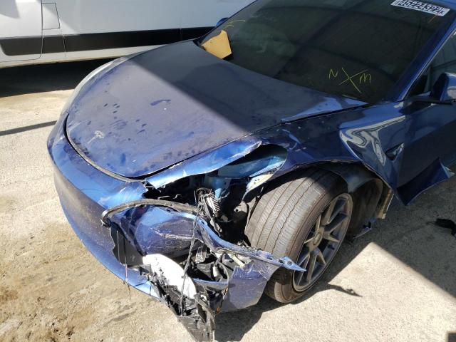 Photo 9 from auction – 2021 TESLA MODEL 3 with VIN 5YJ3E1EB0MF003664