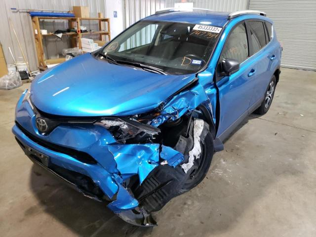 Photo 2 from auction – 2018 TOYOTA RAV4 LE with VIN JTMZFREV0JJ747754