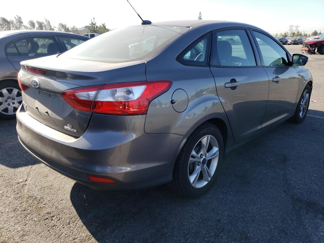 Foto 4 de la subasta – 2013 FORD FOCUS SE con VIN 1FADP3F24DL153689