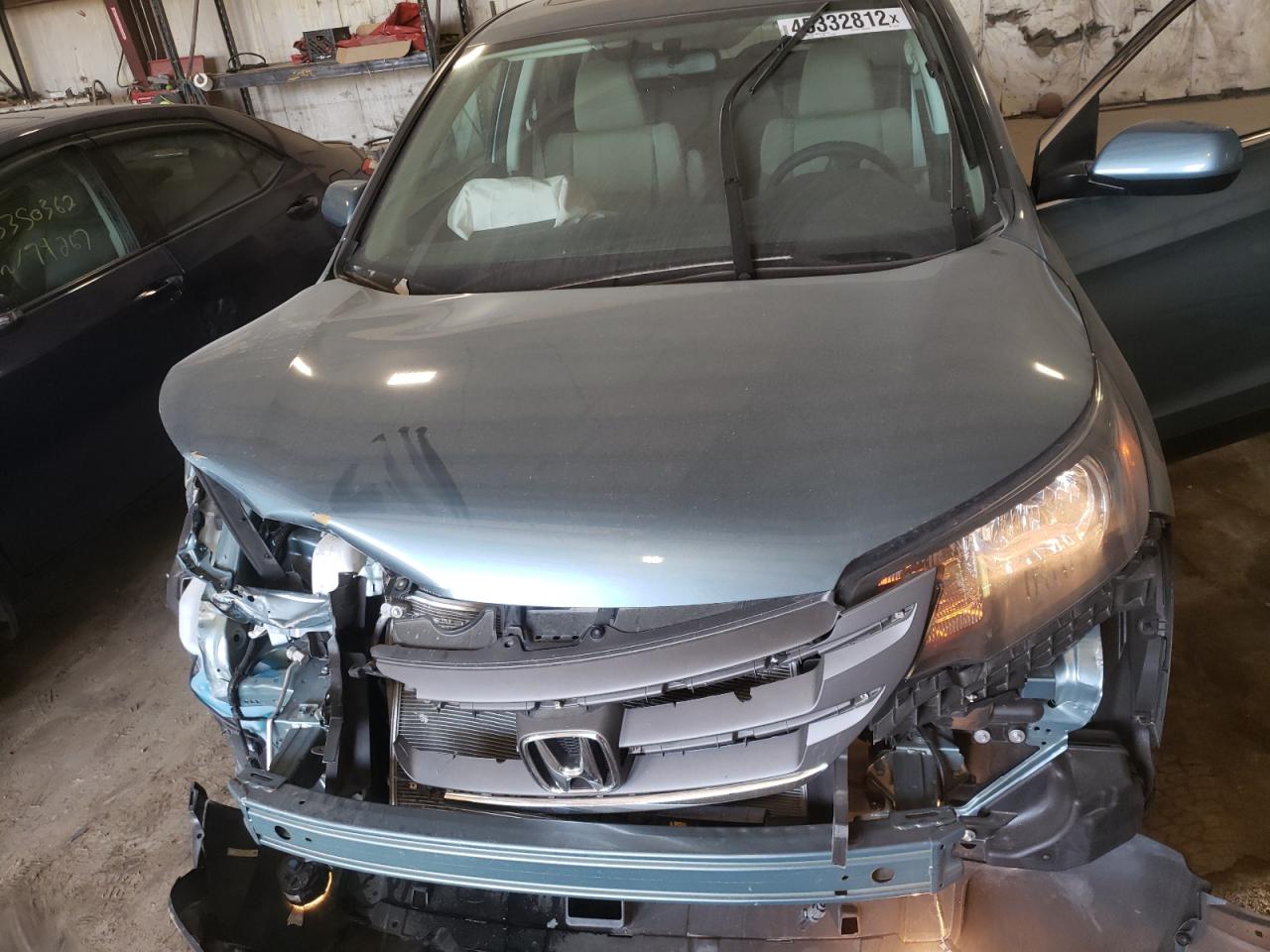 Photo 7 from auction – 2014 HONDA CR-V EX with VIN 2HKRM4H50EH601356