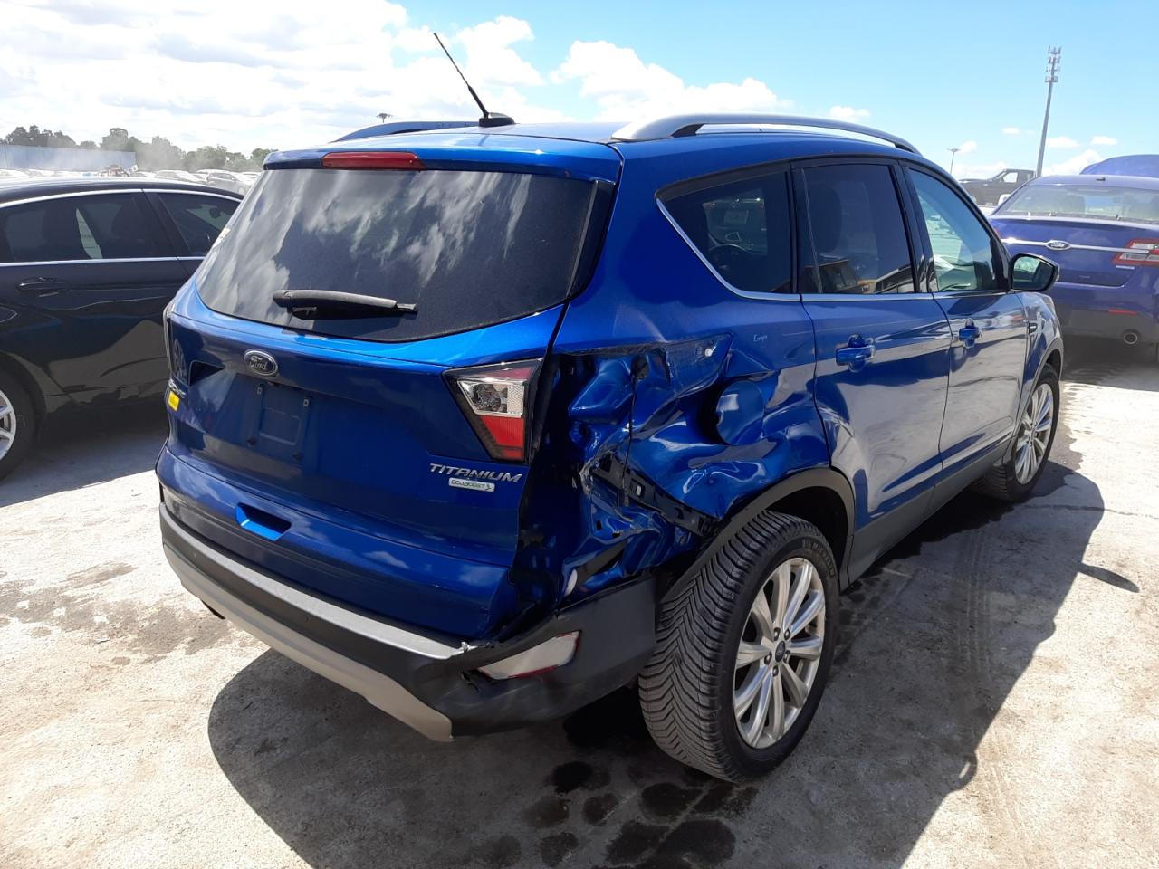 Photo 4 from auction – 2017 FORD ESCAPE TIT with VIN 1FMCU0JDXHUD05265