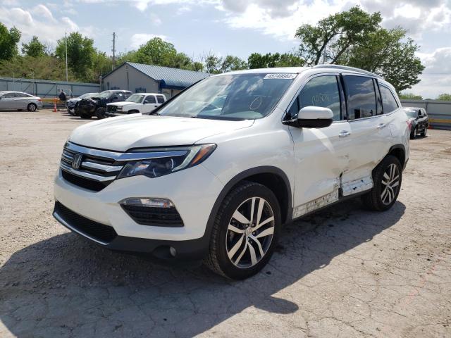 Photo 2 from auction – 2016 HONDA PILOT TOUR with VIN 5FNYF6H90GB040209