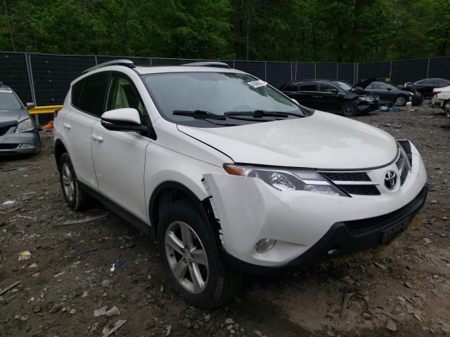TOYOTA RAV4 XLE 2014 with VIN JTMRFREV2ED090945 - Photo from auction