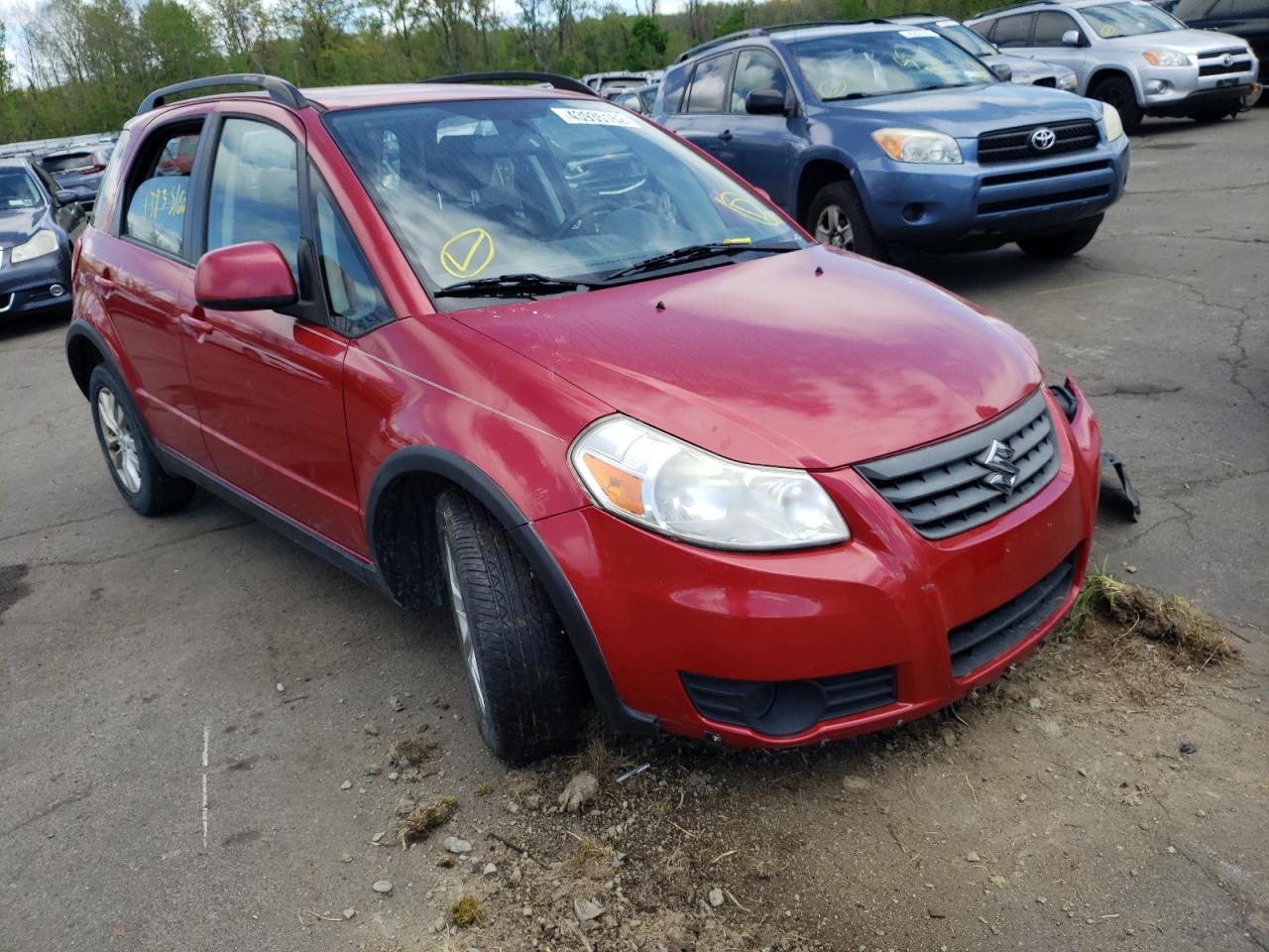 SUZUKI SX4 2013 with VIN JS2YB5A3XD6100571 - Photo from auction