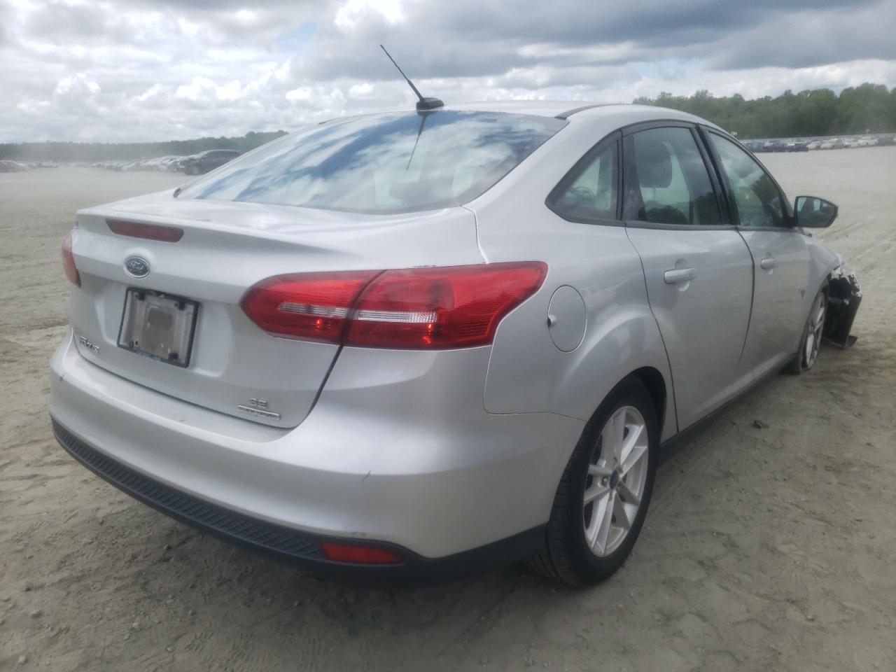 Photo 4 from auction – 2016 FORD FOCUS SE with VIN 1FADP3F28GL401995