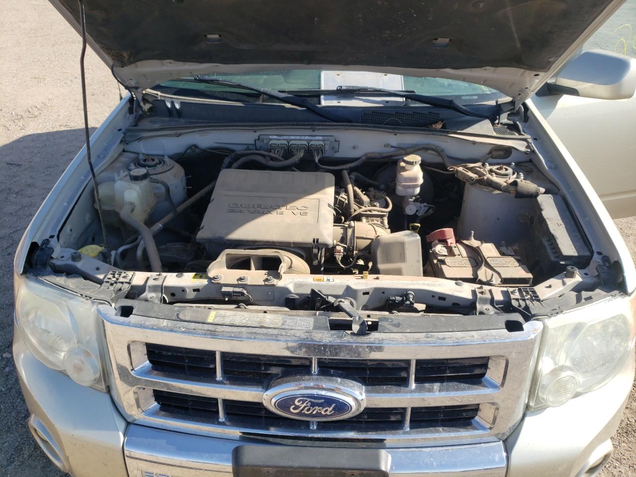 Photo 7 from auction – 2011 FORD ESCAPE LIM with VIN 1FMCU0EG1BKB53643