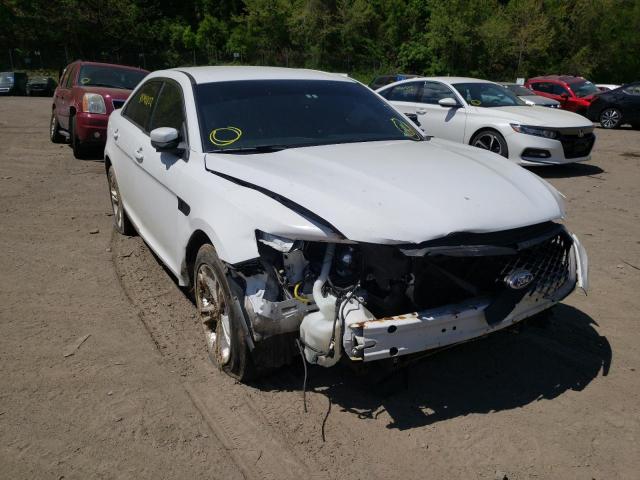 FORD TAURUS POL 2014 with VIN 1FAHP2MK1EG102904 - Photo from auction