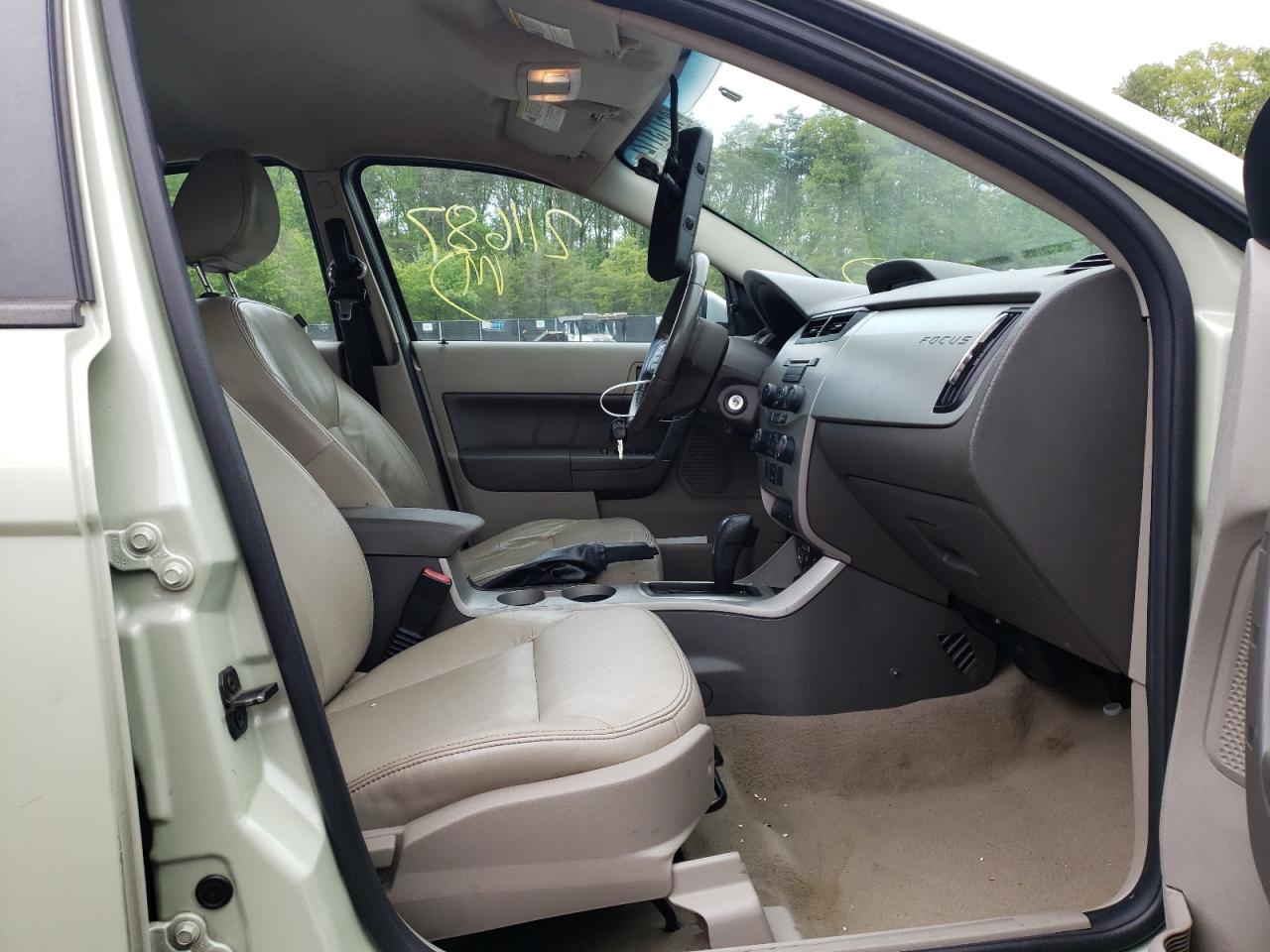 Photo 5 from auction – 2011 FORD FOCUS SEL with VIN 1FAHP3HN7BW143095