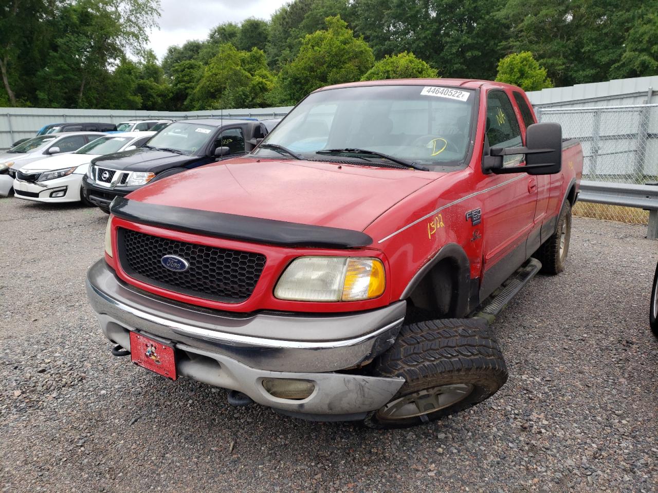 Photo 2 from auction – 2002 FORD F150 with VIN 1FTRX18L92NA83201